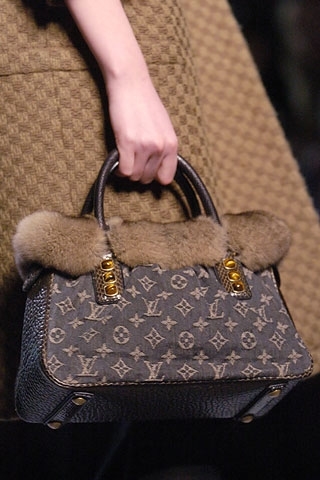 From Louis Vuitton's 2005 Fall/Winter Runway Collection, this stunning bag  is made of Louis Vuitton's Monogram…
